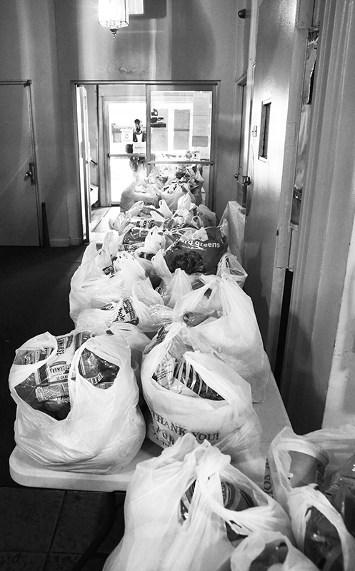 2020 : Food Lines : Seventh Day Adventists Help the Needy : Streetlife : New York City : Times Square : Richard Moore : Photographer : Photojournalist